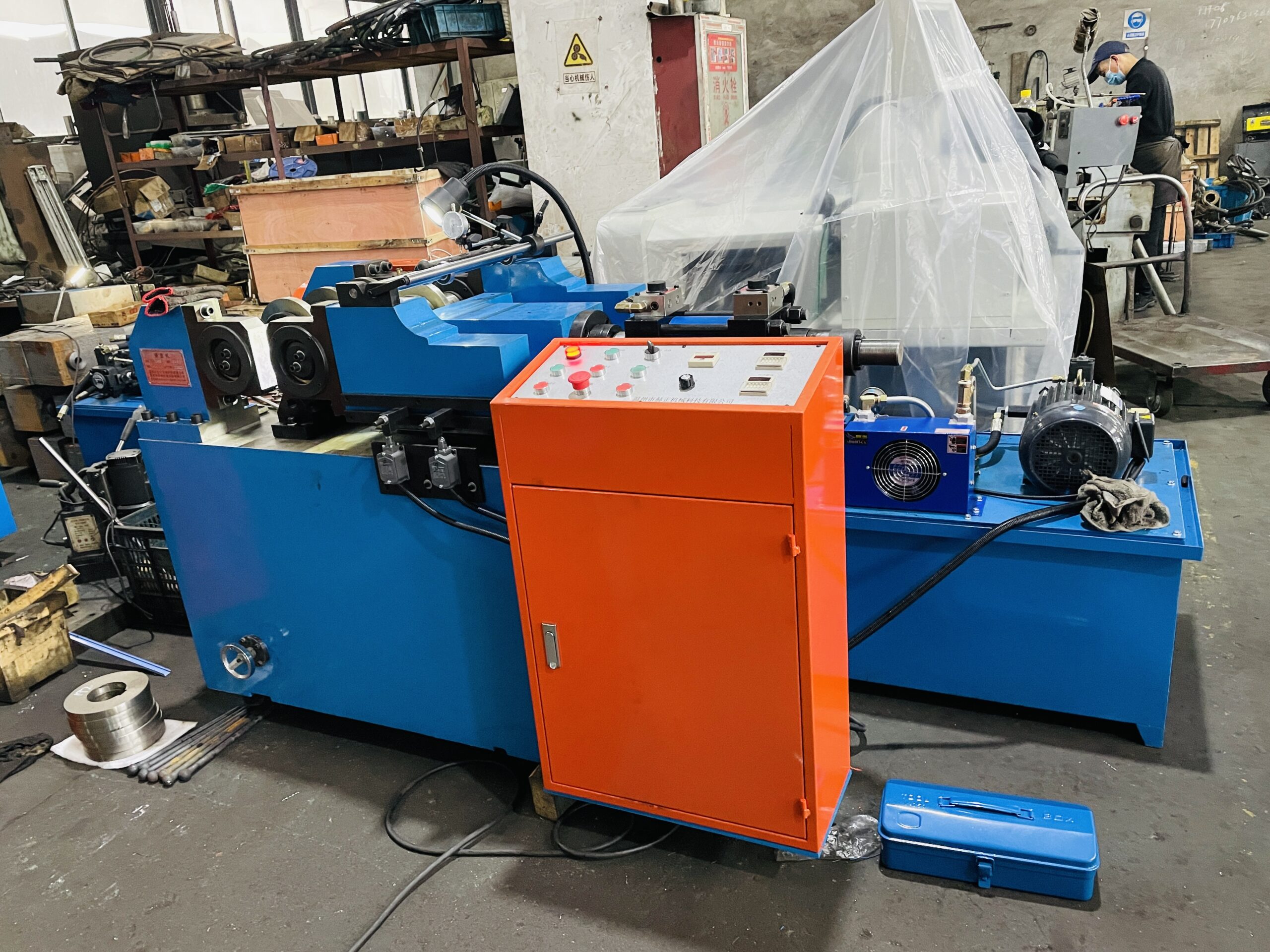 Roller straightening machine prepared for long ball stud blanks