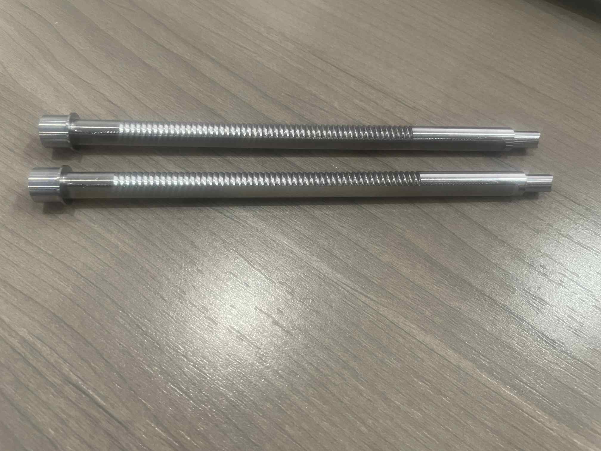 Two toothed drill components with smooth shank and end features