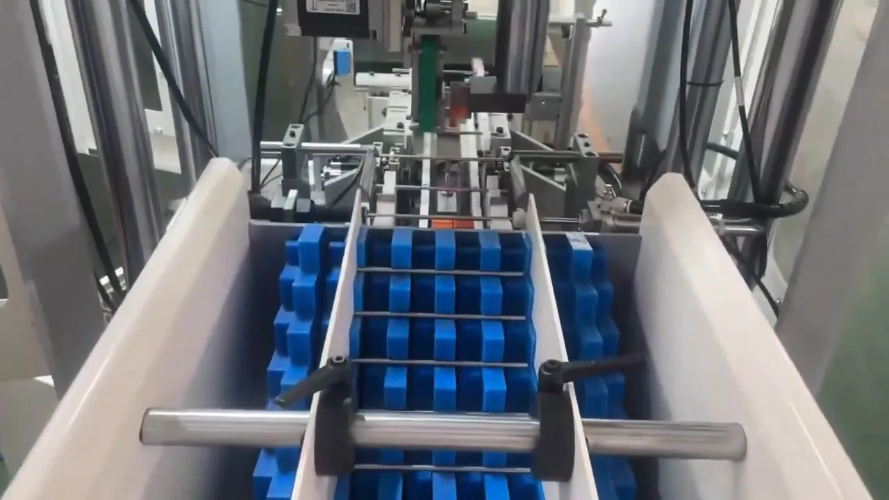 Automatic feeding of slender motor shafts into the straightening machine