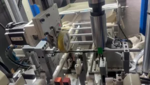 Automatic straightening machine processing a hardened textile shaft